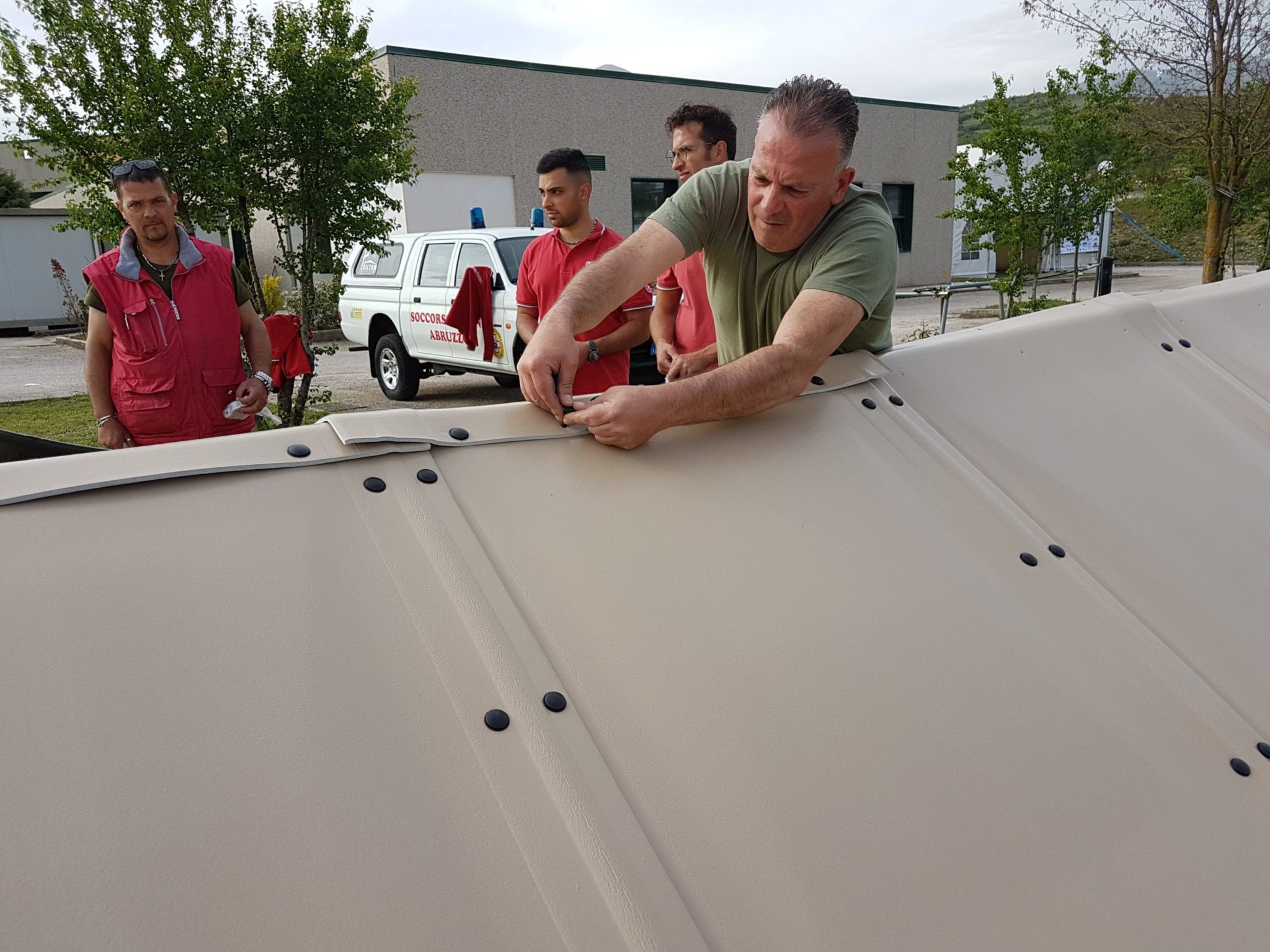 Building temporary shelters with the Italian Red Cross throughout Italy