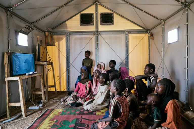 A movie club in Farchana refugee camp, Chad. Photo by Björn Wallander, 2024 for What Makes a Home.